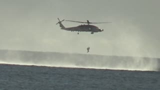 Why Is That Helicopter Hoovering Over The Ocean? Surprise If You Wait..