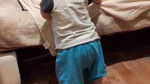 The kid is dancing. Very funny.