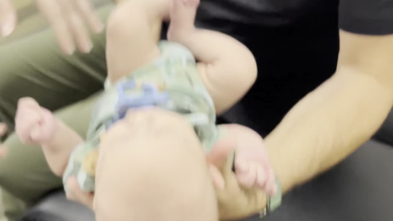 Adjusting baby with jaw clicking