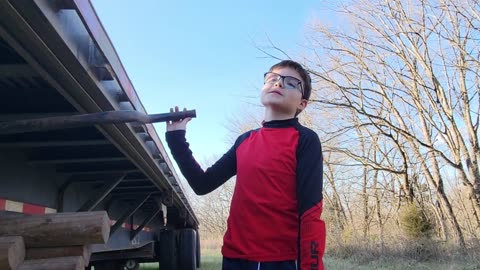 A.J. RAISES THE LANDING GEAR on the WABASH TRAILER