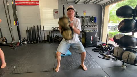 Exercise Technique #11 Sandbag: Clean to shoulder.