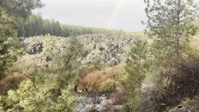 Blessed Heavenly Rainbow Forms Over Lava Rock Volcanic Formation – Deschutes River Trail – 4K