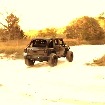 Jeep in the sugar sand
