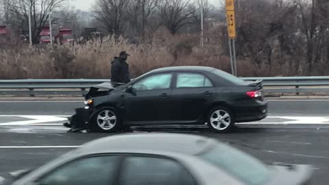 Commuters Collect Cash in the Middle of the Road