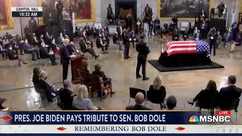 Biden reads a script and says "end of message" out loud and slowly at the end