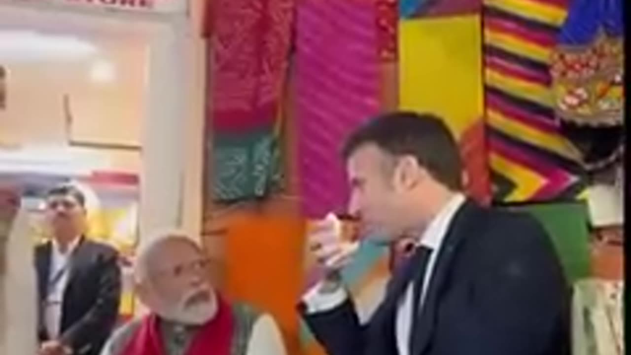 PM Modi & President Macron share light moments over Tea at a local shop in Jaipur