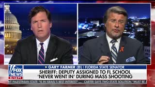 Tucker Carlson grills Gary Farmer 2