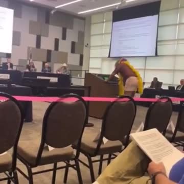 Drag Queen Reads Banned Books To School Board