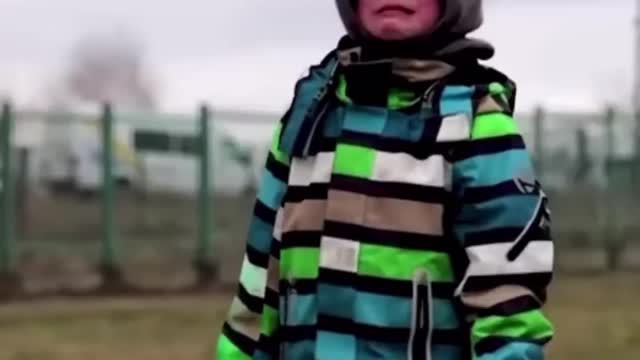 Ukrainian boy crossing the polish border alone with passport and phone number written on his hand