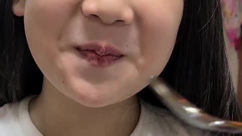 9-year-old Korean girl eating bellflower