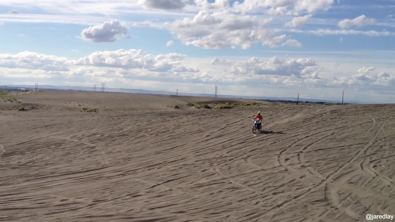 Bmx jump in sand slides out