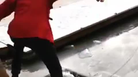 Red jacket guy ice cracks falls into water