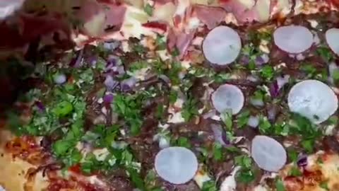 Carne asada pizza