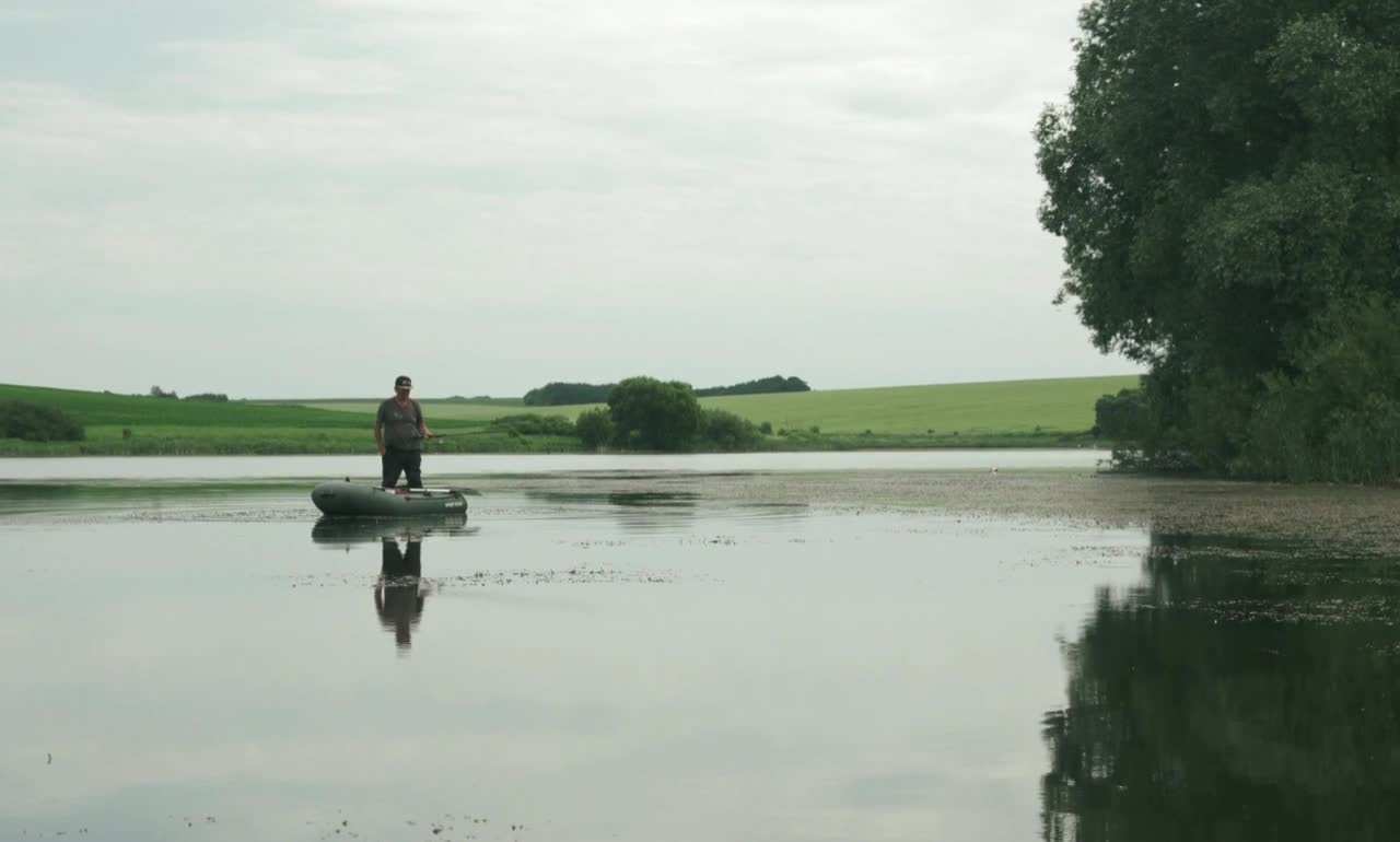 Fisherman uses boat to catch a fish!