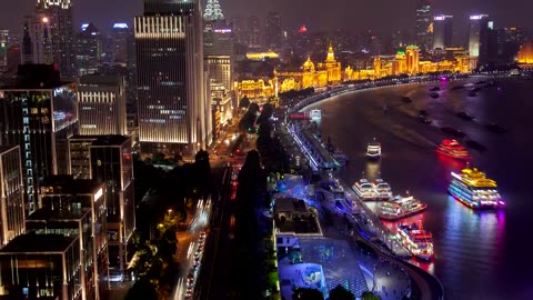 Shanghaiing city scape in the river at night