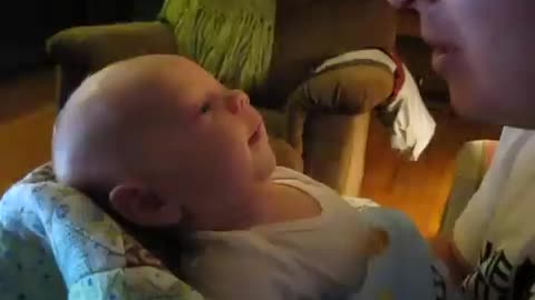 cooing baby singing