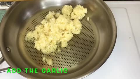 Put The Chopped Garlic In The Pan And Cook