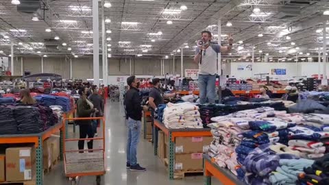 COVID-19 lockdown protester takes a stand (literally) in California Costco against Gov. Newsom