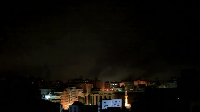 Rockets, explosions light up Gaza night sky