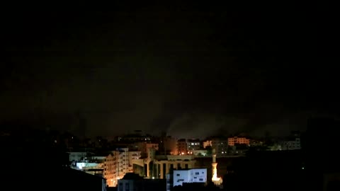 Rockets, explosions light up Gaza night sky