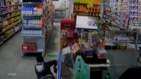 Store Clerk Blasts At Robbers