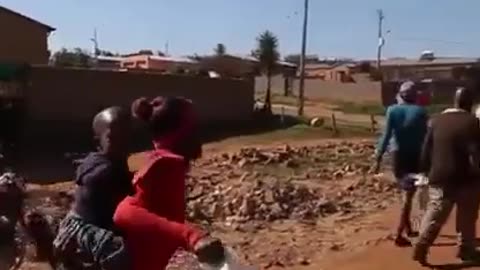 Armed #EFF Bantus (blacks) attack poor White people and steal their food