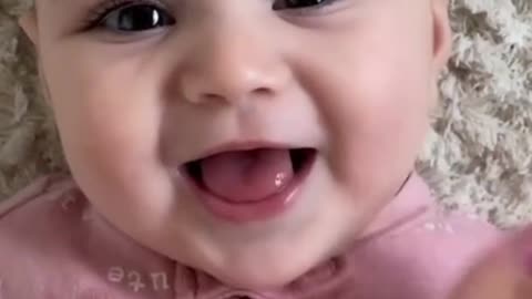 Cute Baby Playing with Mom While Enjoying