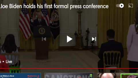 Biden with possible ear piece.