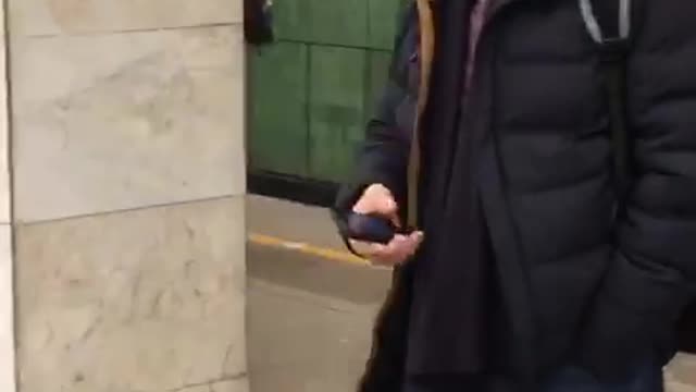 Man skates in subway station skateboard falls on track