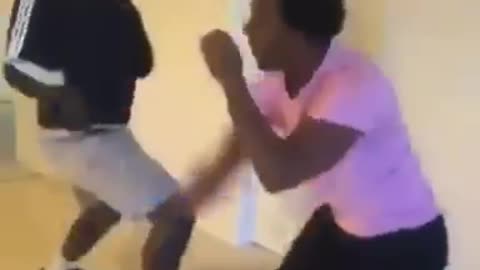 Guy pretend fighting accidently hits other guy