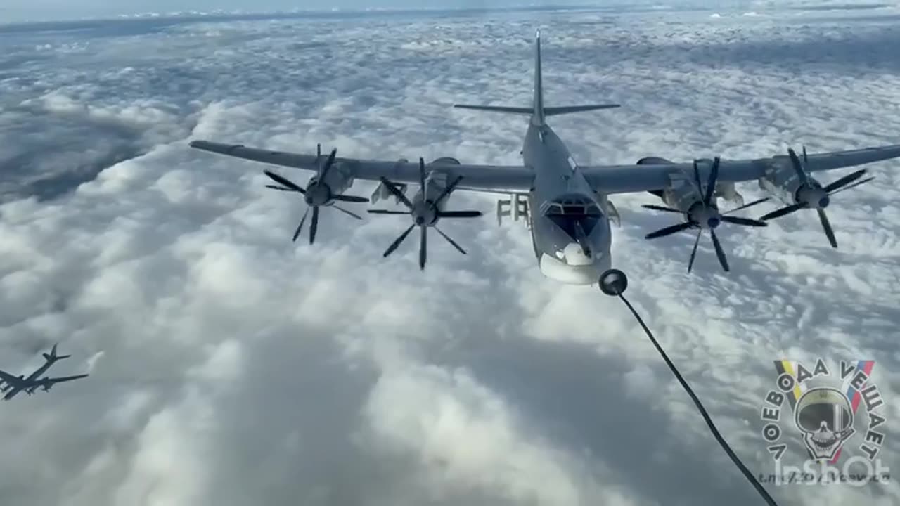 Russian Tu-95 strategic bomber disengages aerial refueling