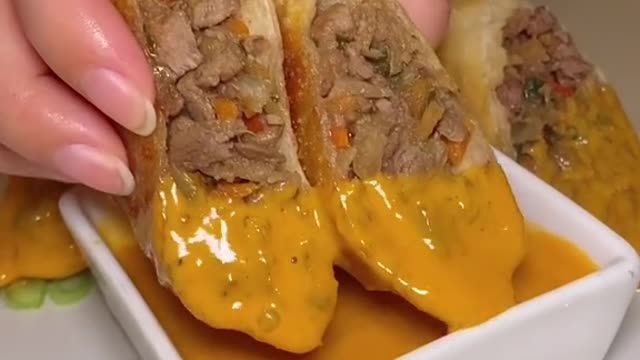 Double dip with the FILET MIGNON SPRING ROLLS w Honey Sriracha Sauce