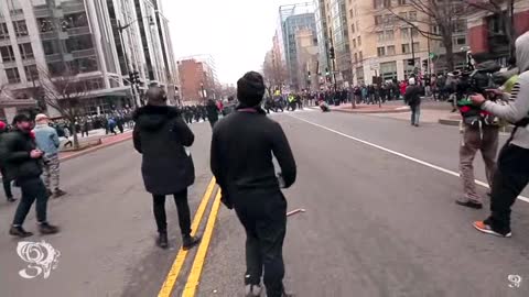 2017 Trump Inauguration: Rioter Launches Large Chuck if Concrete at the Police