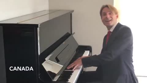 WATCH: ''Trudeau'' plays and sings a new & improved version of 'O Canada " Gender Anthem