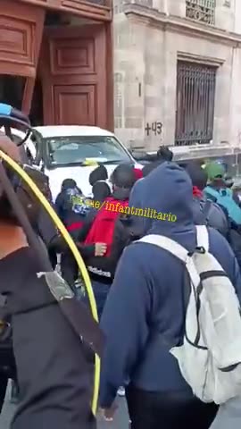 Protesters broke down the gates of the presidential palace in Mexico