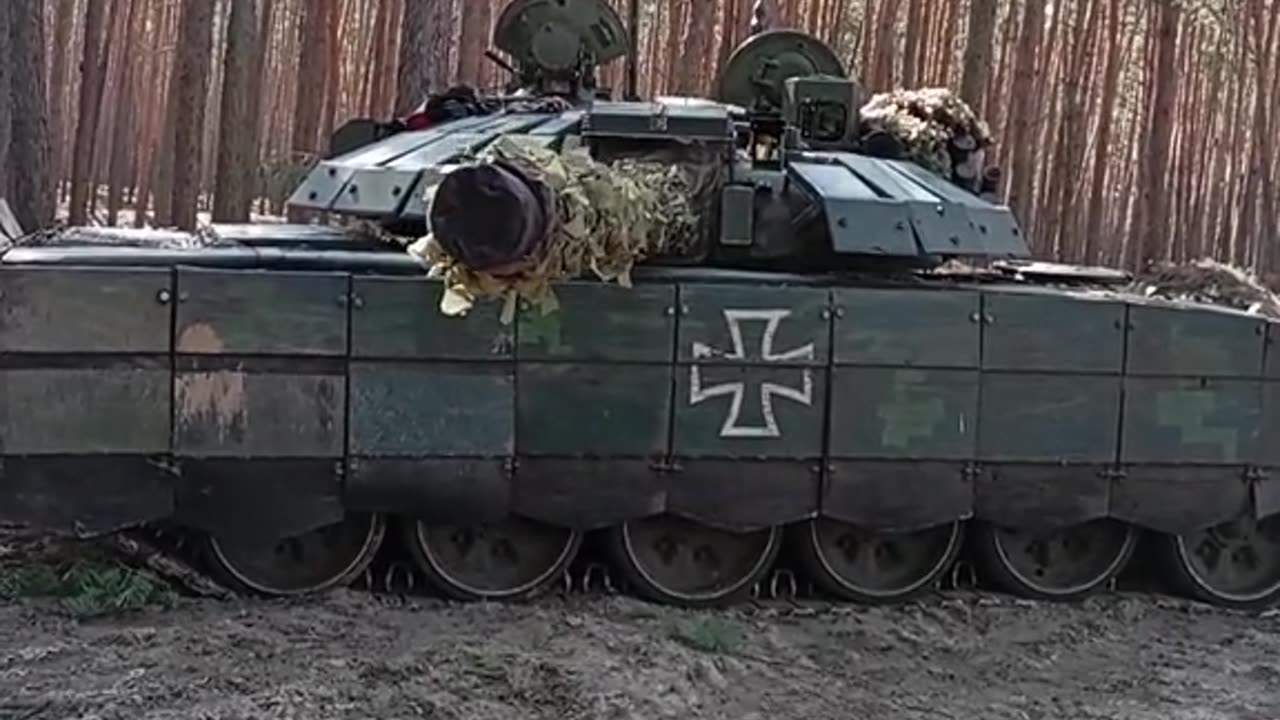 Ukrainian trophy T-72B3 with added dynamic protection.