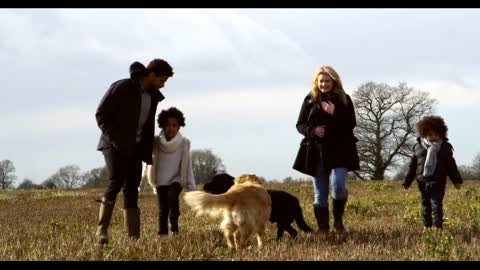 Family Walking With Dogs In Countryside Shot On R3D