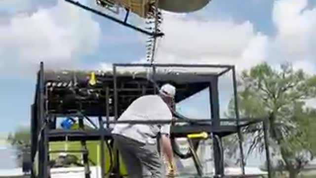 Pilot Lands His Helicopter Neatly Over Truck