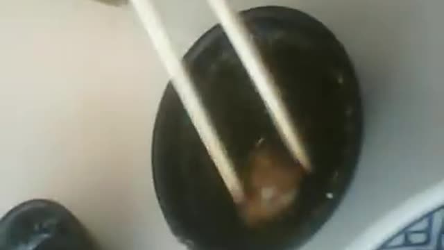 Practice eating bite size food using chopsticks.