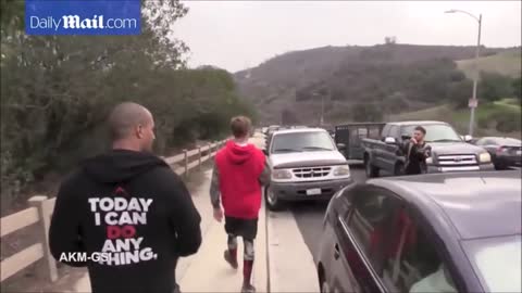 Justin Bieber playing with kid & dog Esther & hiking in Los Angeles, California December 11, 2016