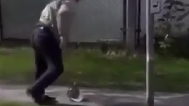 Old Man Tackled For Waving A Flag...Must See!