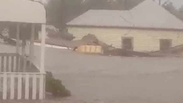 House gets swept away by flash flood in Australia