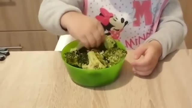 Little Girl Chooses to eat Broccoli Over Chocolates and Candies