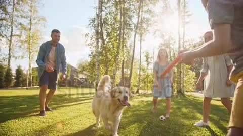 Family and dog playing