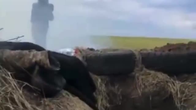 Ukrainian soldier fires a MANPADS missile at a Russian fighter jet