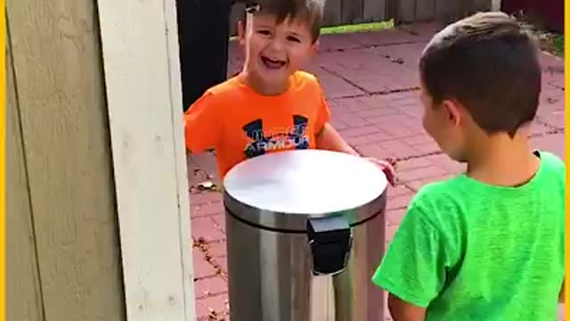 Adorable Kids Hit Each Other In The Face With Bin Lid