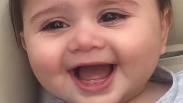 Cute baby laughing