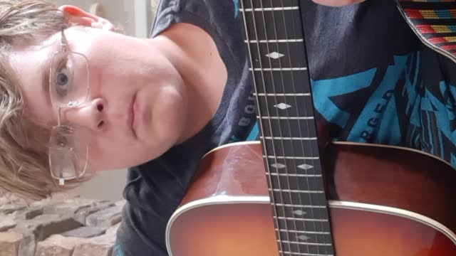 Viral video*** of a kid playing the guitar