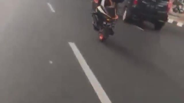Motorcycle wheelie show off