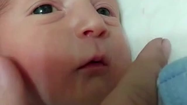 Funny and very small baby